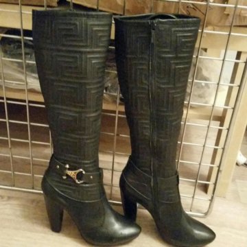 Продаю новые кожаные сапоги