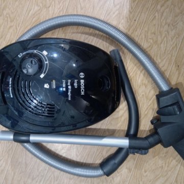 Бош бсн 2100 пылесос. Пылесос bosch bsn2100ru. Пылесос bosch logo 2100w. Пылесос бош с мешком 2100. Пылесос bosch bgl 252103.