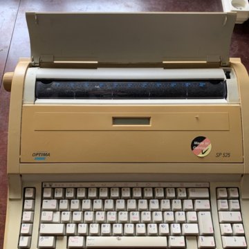 Электрическая печатная машинка Optima