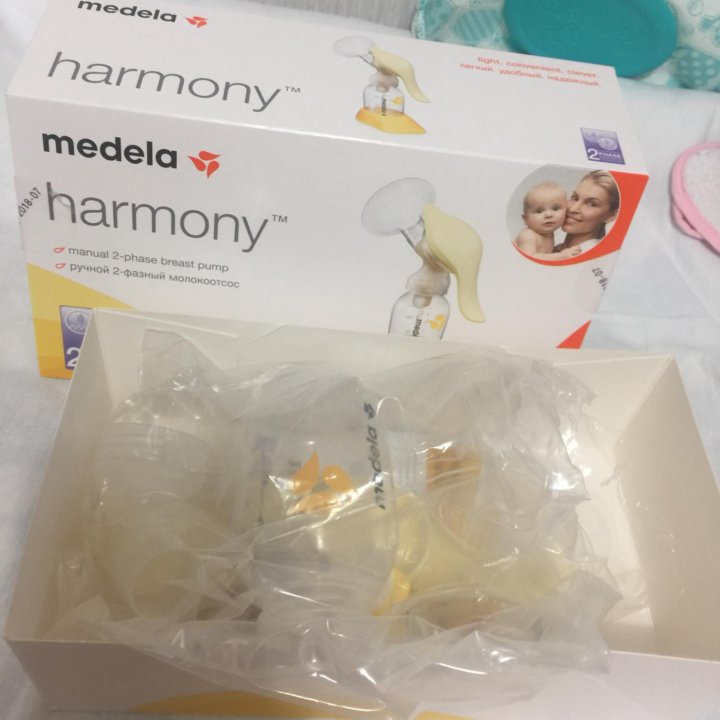 Молокоотсос medela