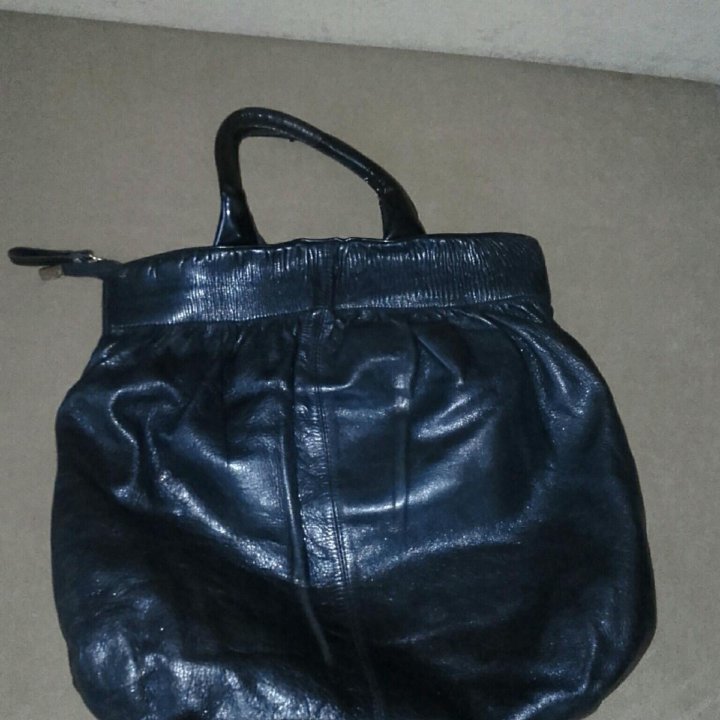 Кожаная сумка.