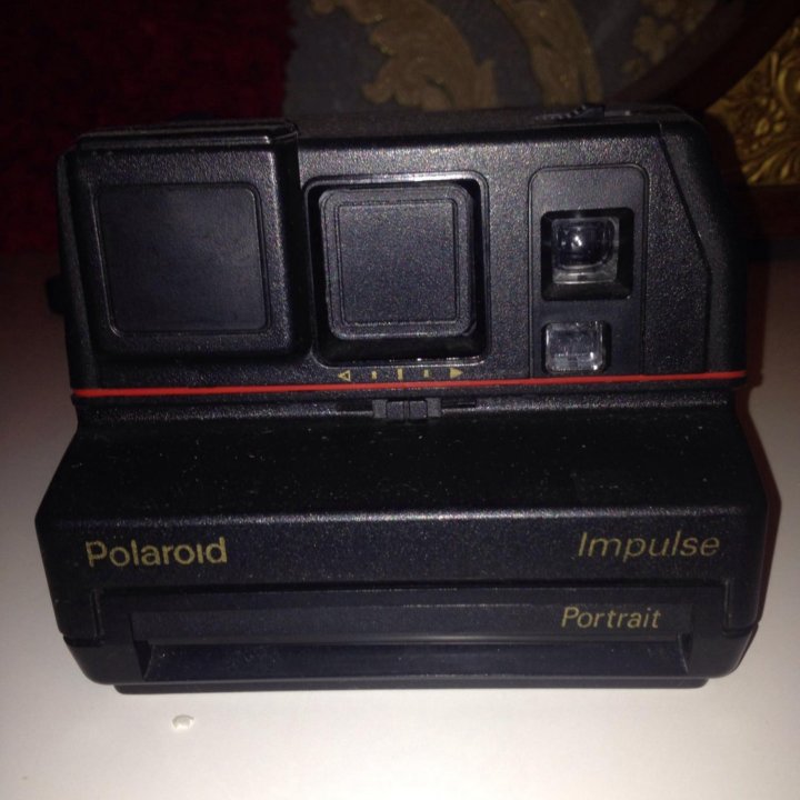 Фотоаппарат Polaroid.