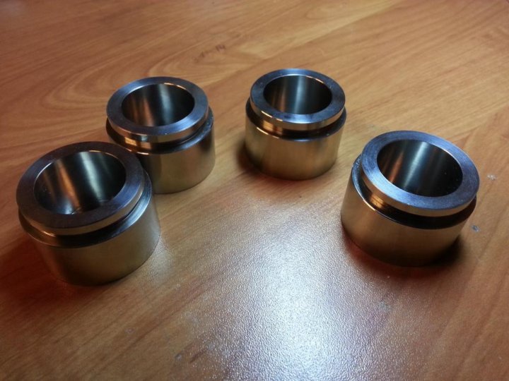 поршня из нержавейки для суппортов паджеро 4. нержавеющий поршень для тормозного суппорта honda cr-v 4 2,4 из нержавейки. суппорта из нержавейки. суппорт нержавейка. тормозные поршни из нержавейки для паджеро спорт 2.