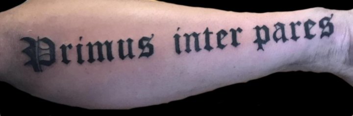 Тату надпись primus inter pares - фото салона Tattoo Times, узнай цену на сайте.