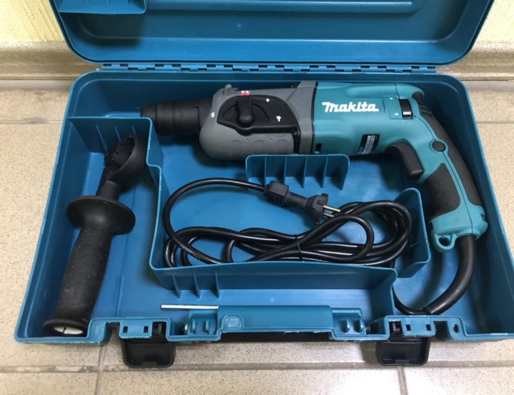 Makita hr2470x19 780 вт. Перфоратор Makita hr2470. Кейс Макита 2470. Реклама Макита перфоратор. Новинки Макита 2023.