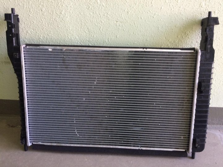 Радиатор captiva. Captiva 2.4 Radiator oxlajdeniya. Радиатор Шевроле Каптива 2.4 с100. Радиатор Каптива с100. Радиатор Шевроле Каптива 2.2 дизель.