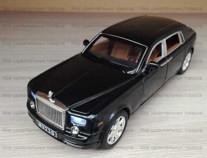 Авито спб машинки. Rolls Royce 1/24. Игрушечная машина чёрный Rolls-Royce. Коллекционные машины Rolls Royce 1:24. Большой Ролс Ройз игрушка детский мир.
