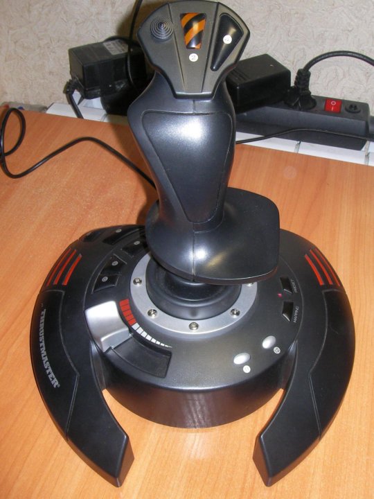 Flight stick x. Джойстик Thrustmaster t.Flight Stick x. Thrustmaster t128. Джойстик Thrustmaster t.Flight Stick x черный. Thrustmaster t.Flight Stick x снизу.