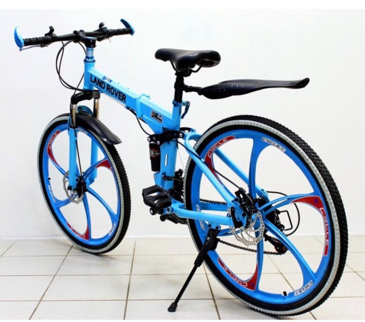 Купить велосипед складной бу. Велосипед БМВ, Лэнд Ровер. BMW велосипед синий. Велосипед ленд Ровер на литых дисках. Велик Новосибирск.