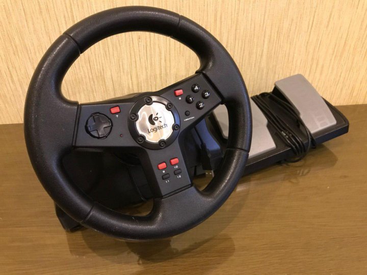 Руль logitech formula vibration feedback wheel. Руль Logitech e-uk12. Руль руль Logitech Formula Vibration. Игровой руль Logitech Formula Vibration характеристики. Logitech e-uk12 драйвер.