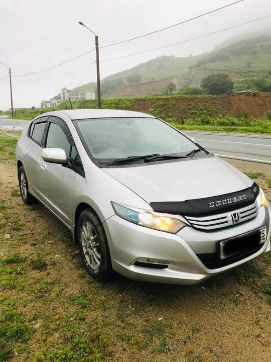 Хонда инсайт белая 2010. Хонда инсайт бензин. Хонда инсайт бензин. Honda insight ze3. Хонда инсайт 2010 серая.