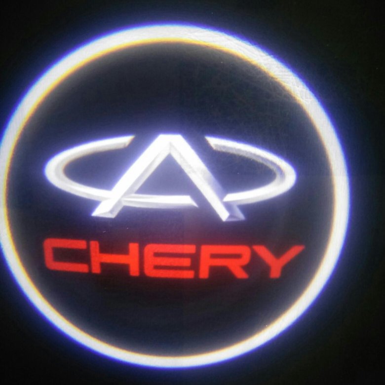 Chery что значит. Логотип чери. Lexus значок Chery. Заставка логотип Chery. Эмблема на Chery Tiggo t 11 Рестайлинг.