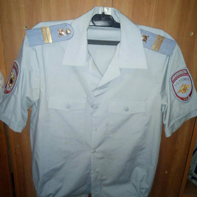 Белая рубашка полиции с погонами фото