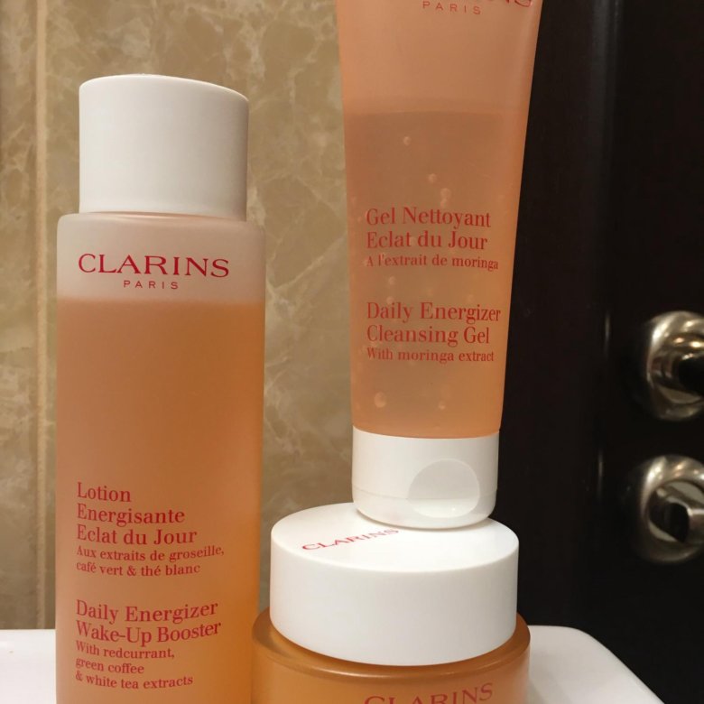 Clarins eclat du jour. Clarins крем Eclat du jour. Кларанс Creme Eclat du jour. Крем для лица Clarins Eclat du jour. Крем кларанс оранжевый.