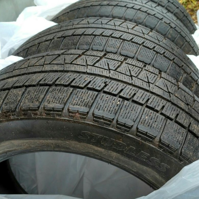 Шины бриджстоун зимние. Bridgestone Blizzak Revo GZ r16. Bridgestone Blizzak Revo GZ 205/55 r16. Blizzak Revo GZ 205/55 r16. Bridgestone Blizzak Revo GZ 205/55 r16 91s.