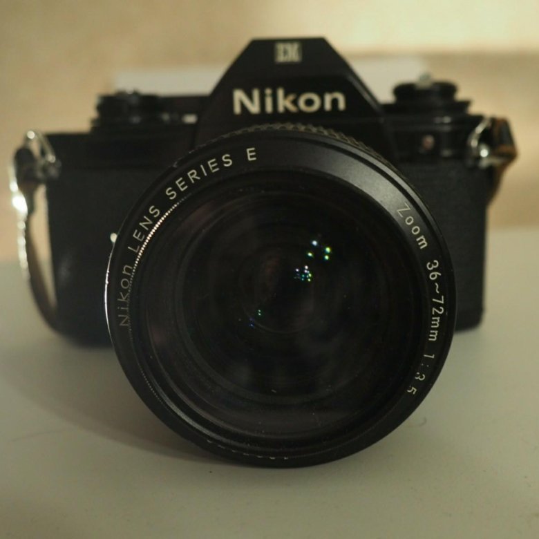 nikon em harga