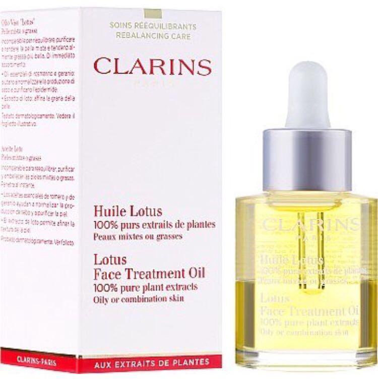 Масло clarins. Масло Лотус кларанс. Clarins Paris масло. Clarins huile Lotus 125 ml. Clarins Lotus treatment Oil.