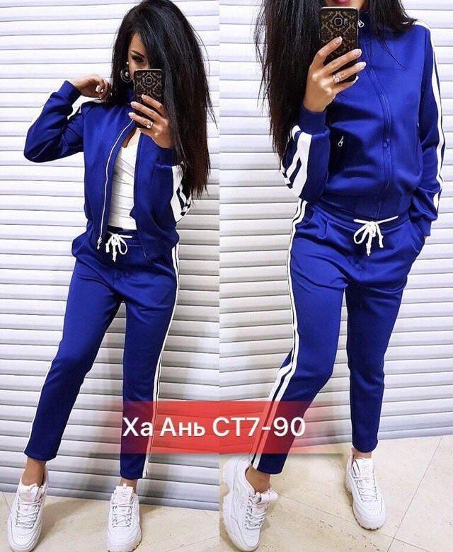 Купить ткань для спортивного костюма. Модные спортивные костюмы для девушек. Синий костюм женский спортивный без капюшона. Женские спортивные костюмы на змейке. Спортивный костюм синий с полосками.