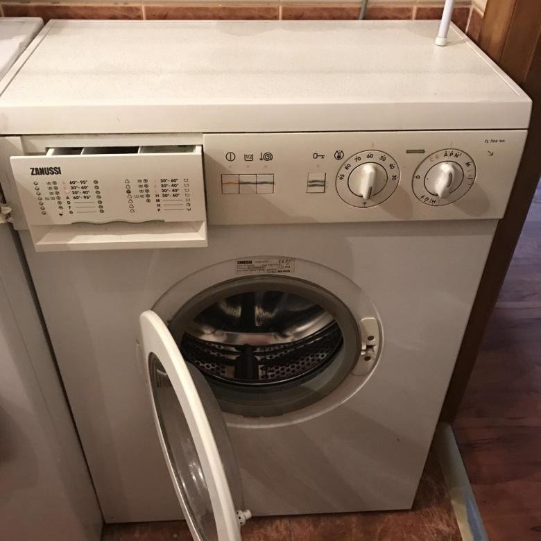 Zanussi fl 704 nn. Стиральная машина Zanussi fl704. Стиральная машина Занусси 704. Zanussi fl704 n n стиральная машина.