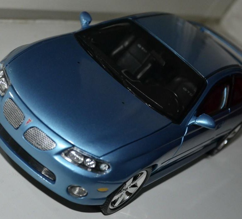 Авито масштабные модели. Pontiac GTO 2004. Pontiac GTO 1 18 Autoworld. Игрушки модель автомобиль Pontiac GTO 2004 1/18. Pontiac GTO 2004 Ford.