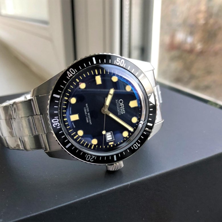 Oris divers sixty-five. Oris 65 divers black. Oris 65. Oris swiss made watches since 1904. Oris sixty-five.