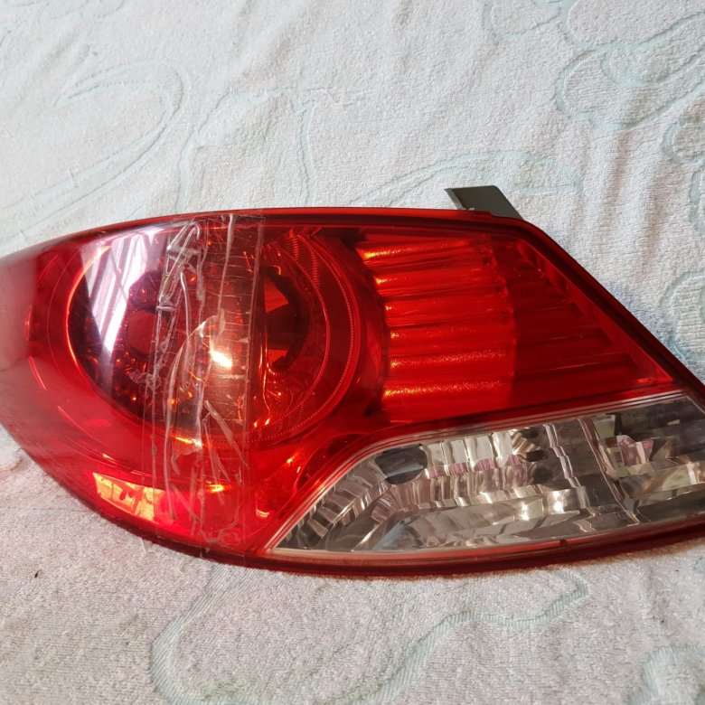 Задний левый фонарь солярис 2013. Фонарь задний хендай солярис 2011 левый артикул. Фонарь задний левый солярис. Фонарь задний левый солярис. Задний левый фонарь хендай солярис 2011.