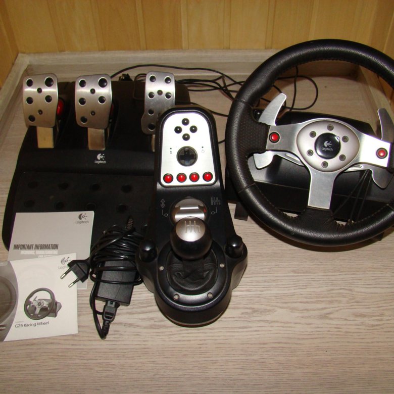 Игровой руль 900 градусов. Руль Logitech g25. Руль g25 Racing Wheel. Игровой руль Logitech g25 Racing Wheel. Руль с педалями для компьютера Logitech g25.