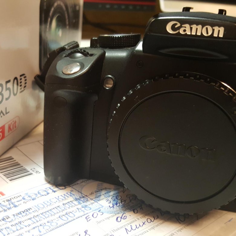 Canon 350d. Canon 350. Canon EOS 350d in hands. Canon eos 350d