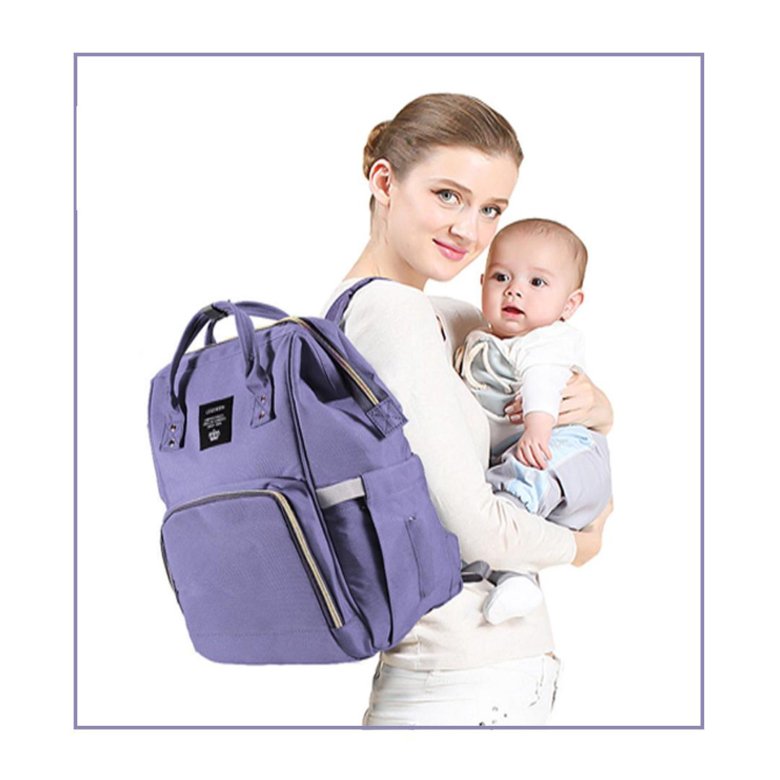 Женщина с сумками и детьми