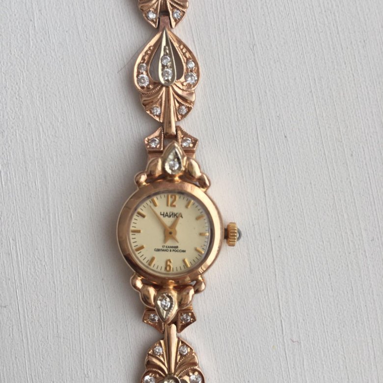 Золотые часы чайка женские цены. Золотые часы Чайка 23019. Золотые женские часы Чайка кварц 4150. Часы Чайка 1301 с браслетом. Женские золотые часы Чайка 25646.
