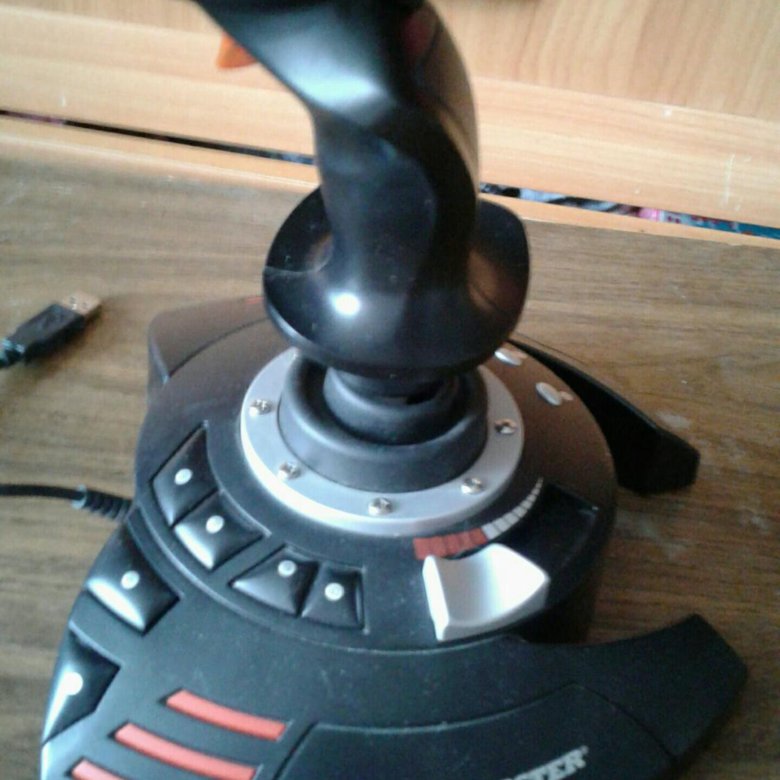 Thrustmaster flight stick x. Джойстик Thrustmaster t.Flight Stick x черный.