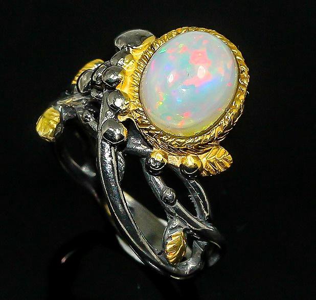 Opal flora. Кольцо с опалом в серебре.