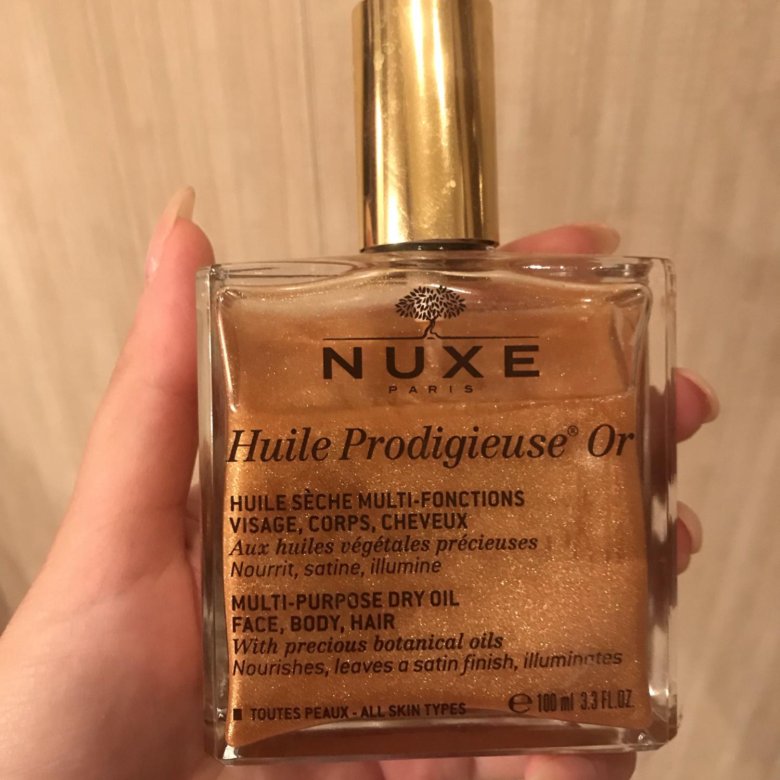 Масло nuxe отзывы. Nuxe масло с шиммером. Масло для тела с блестками. Масло Nuxe с блестками. Масло с блестками для тела Nuxe.