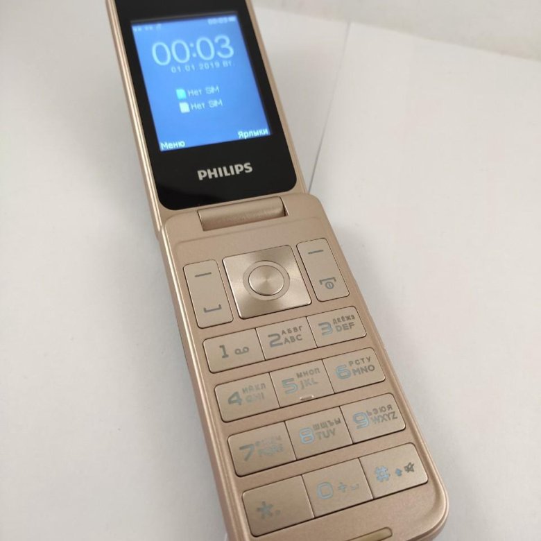 Телефон philips раскладушка. Филипс е255. Xenium e255. Philips Xenium раскладушка e255. Телефон Филипс Xenium е255.