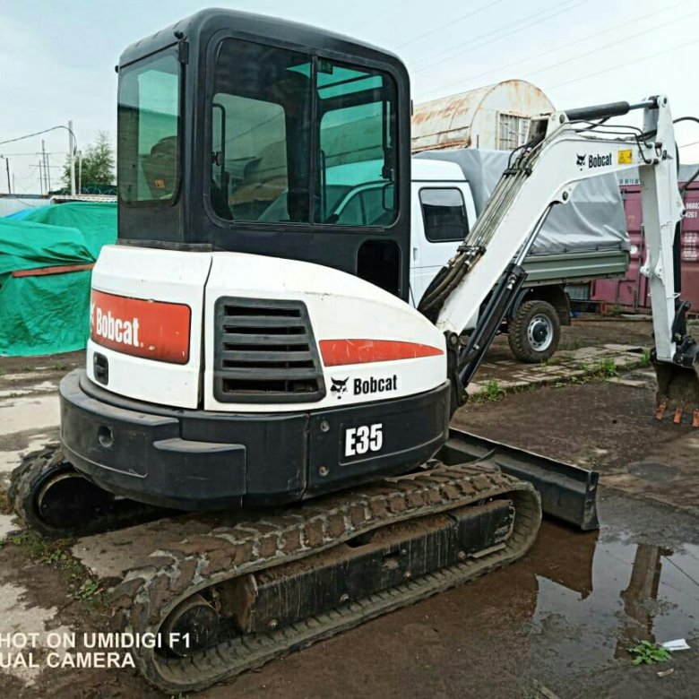 Bobcat e35. Гусеничный экскаватор бобкэт. bobcat e35 кабина.