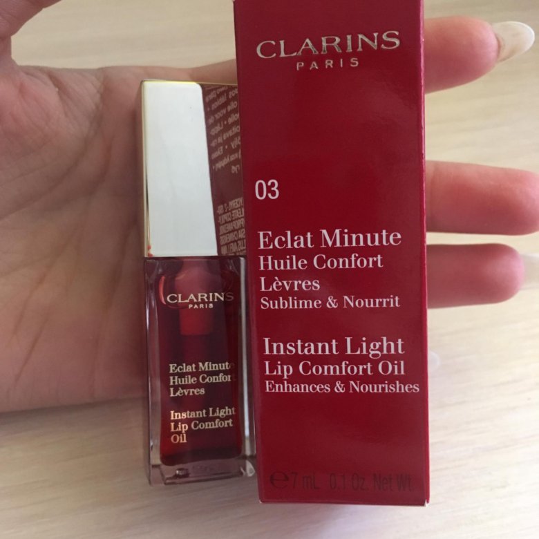 Clarins eclat minute lip comfort. Масло блеск кларанс. Clarins Eclat масло-блеск для губ. Блеск масло кларанс 08. Масло для губ Clarins 03.