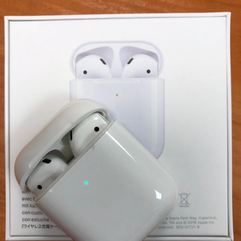 Airpods 2 с зарядным футляром. Айрподс 2. Apple AIRPODS 2 С зарядным футляром. Беспроводные наушники Apple Earpods 2 с беспроводным зарядным футляром. Apple AIRPODS 2 С беспроводным зарядным футляром mrxj2 чехол.