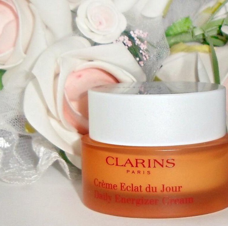 Eclat du jour. Крем для лица Clarins Eclat du jour. Крем кларинс для лица сияние кожи. Оранжевый крем от кларанс. Clarins choice крем для сияния кожи комплексный 25 гр.