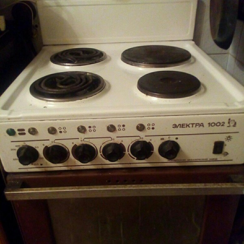 плита электрическая электра 1002. электроплита с духовкой электра 1002. эл плита электра 1002 переключатель. плита электра 1002 год выпуска. электра 1002.