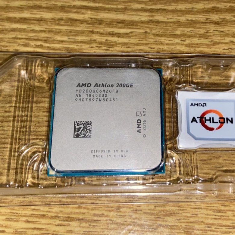 Amd athlon 200ge характеристики. AMD Athlon 200 ge CPU. Процессор AMD 200ge. Процессор AMD Athlon 200ge OEM ядер потоков. AMD Athlon 200ge купить.