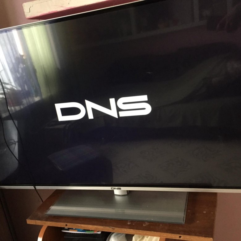 Сколько стоит телевизор в днс. ДНС телевизоры. Телевизор ДНС 32. DNS телевизоры Донецк. Изогнутый телевизор ДНС.