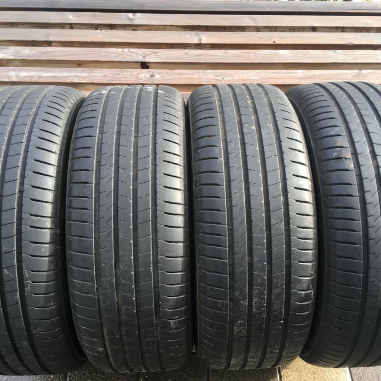 Bridgestone alenza 001 225 60 r18. Бриджстоун Аленза 001. 235/55r18 100v Alenza 001. Бриджстоун 255/55/19 w 107 alenza1 XL. Bridgestone 235/55 r18 alenza1 100v.